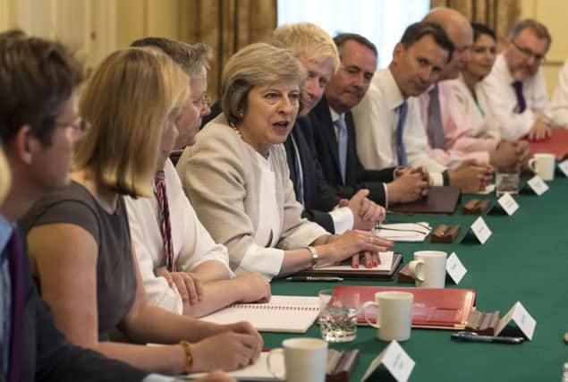 Theresa May will lay down her ministers roles in the implementation of the Brexit vote. Picture: PA