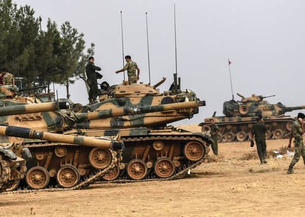 At least 10 more Turkish tanks crossed the border into Syria a day after pro-Ankara Syrian opposition fighters ousted jihadists from the town of Jarabulus close to the frontier.
Picture: Getty Images