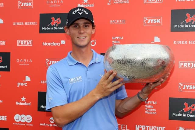 Thomas Pieters of Belgium poses with the trophy following his victory during the final round of Made in Denmark at Himmerland. Picture: Andrew Redington/Getty Images