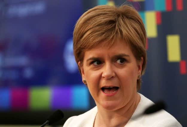 First Minister Nicola Sturgeon announced funding of up to Â£300,000 to extend a programme training women in conflict resolution. Picture: PA