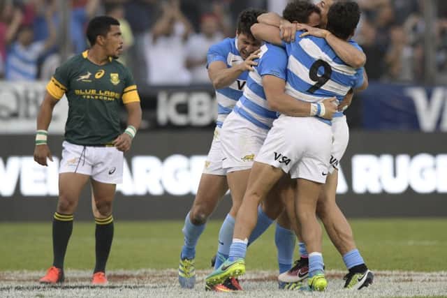 Argentina players celebrate victory over South Africa at the Padre Ernesto Martearena stadium in Salta. PicturE: AFP/Getty Images