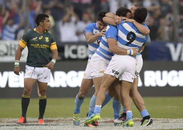 Argentina players celebrate victory over South Africa at the Padre Ernesto Martearena stadium in Salta. PicturE: AFP/Getty Images