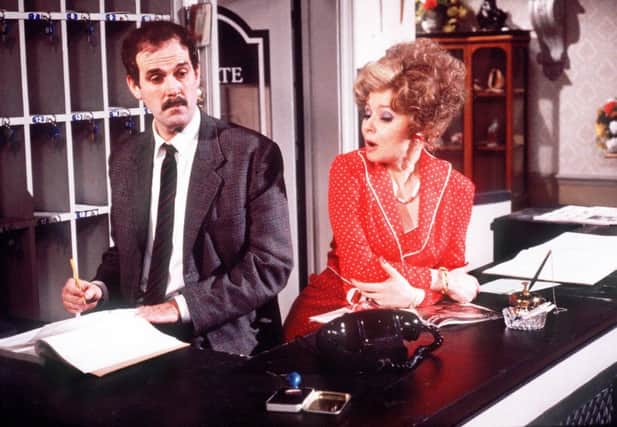 Prunella Scales and John Cleese in Fawlty Towers, a high watermark for TV comedy that the BBC isnt touching in its rush to remake. Picture: BBC