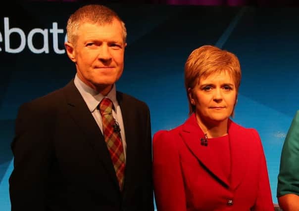 Where once they stood side by side over Britains exit from Europe, Lib Dem leader Willie Rennie and First Minister Nicola Sturgeon are now far apart. Picture: PA