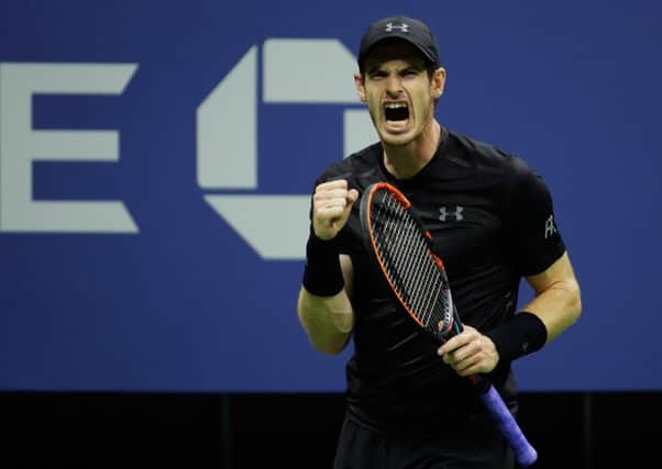 Andy Murray celebrates during the Men's Singles match against Lukas Rosol Picture: Getty