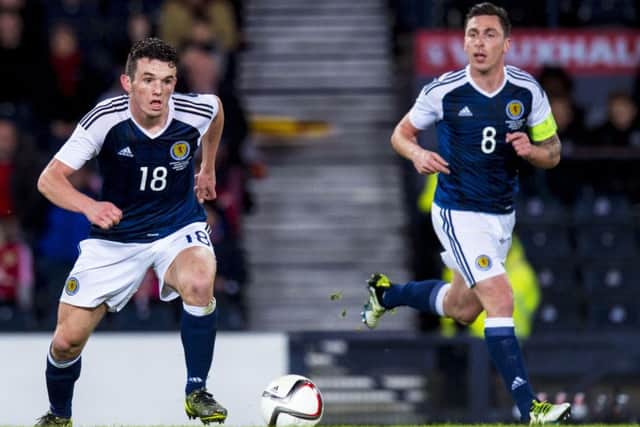 John McGinn was nursed through his Scotland debut by Scott Brown. Picture: Alan Harvey/SNS
