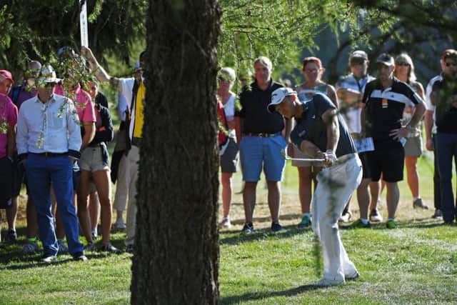 Danny Willett plays his second shot on the 14th hole at the Omega European Masters. Picture: Getty.