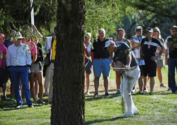Danny Willett plays his second shot on the 14th hole at the Omega European Masters. Picture: Getty.