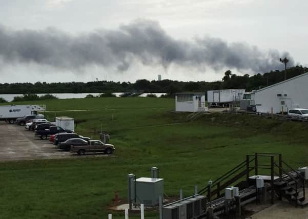 Smoke rises from a SpaceX launch site. Picture: PA