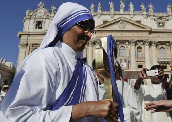 Thousands of pilgrims thronged to St. Peter's Square on Sunday for the canonization of Mother Teresa. Picture: AP