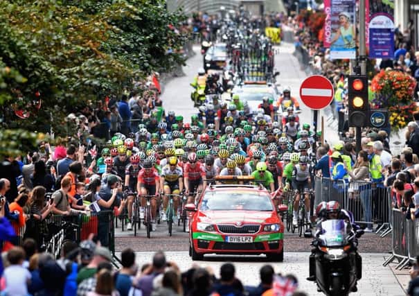 After leaving George Square, the riders head up Glasgows Buchanan Street. Picture: Getty