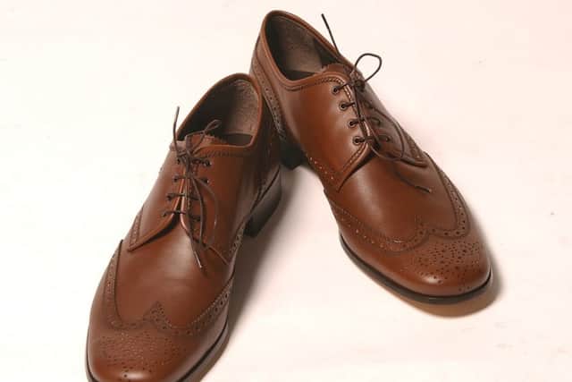 Dont wear brown shoes if you want to be an investment banker. Picture: Neil Hanna