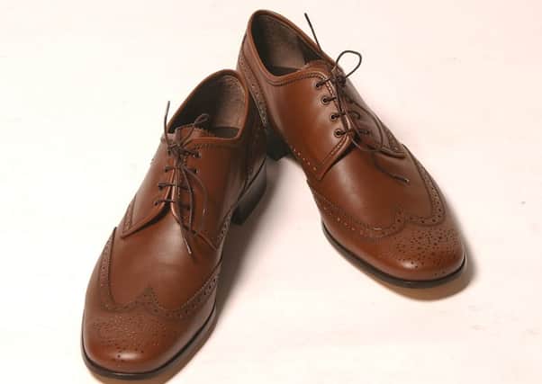 Dont wear brown shoes if you want to be an investment banker. Picture: Neil Hanna