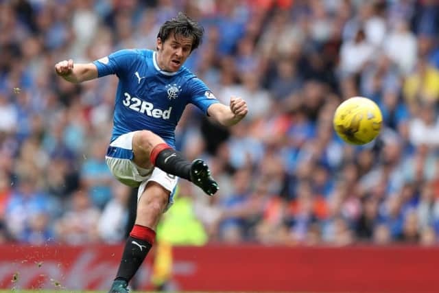 Joey Barton has wound up Scottish football rivals with provocative tweets  but his manager is not worried. Photographs: Getty
