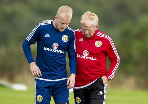 Scotland's Steven Naismith takes advice from manager Gordon Strachan in training. Picture: Craig Williamson/SNS