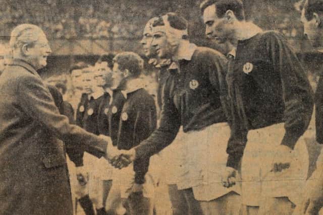 Frans ten Bos shakes hands with prime minister Harold MacMillan before a Calcutta Cup match at Twickenham.  Picture: Robert Perry