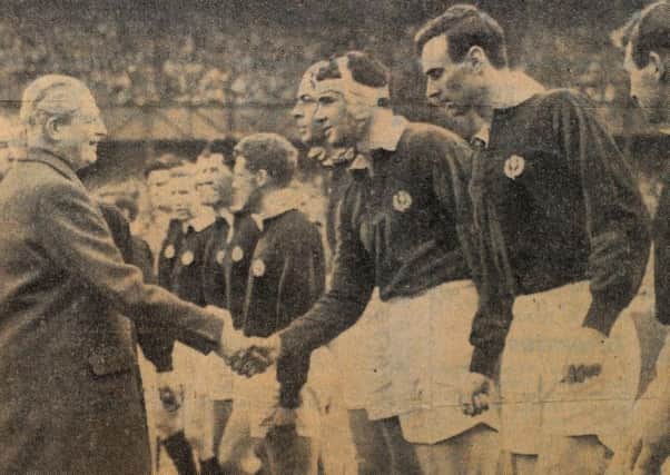 Frans ten Bos shakes hands with prime minister Harold MacMillan before a Calcutta Cup match at Twickenham.  Picture: Robert Perry