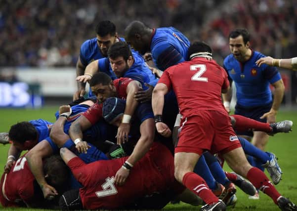 France's and Wales' players vie for the ball in a ruck during the Six Nations international rugby union match between France and Wales on February 28, 2015 at the Stade de France in Saint-Denis, north of Paris.   AFP PHOTO / FRANCK FIFE        (Photo credit should read FRANCK FIFE/AFP/Getty Images)