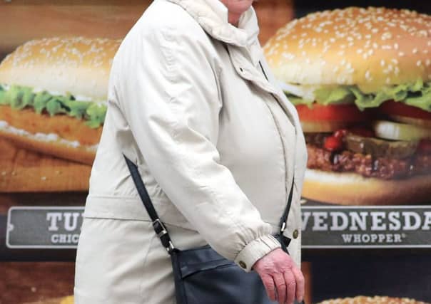 Obesity is a major cause of illness. (Photo by Matt Cardy/Getty Images)