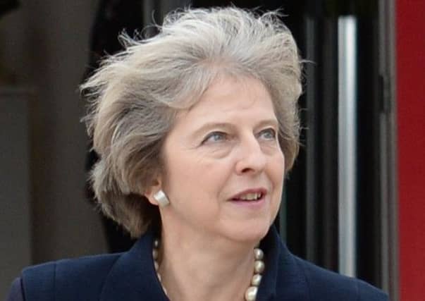 Prime Minister Theresa May before she boards a plane for the G20 Summit in Hangzhou in China. Picture: PA