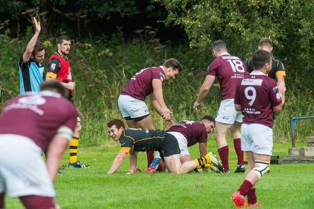 Gala's Ross Combe goes over for a try. Picture: Ian Georgeson
