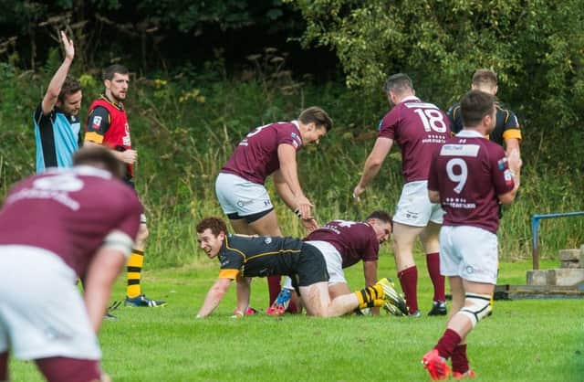 Gala's Ross Combe goes over for a try. Picture: Ian Georgeson