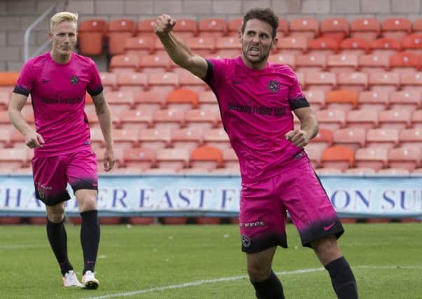 Dundee United debutant Tony Andreu celebrates his goal to make it  3-2 in ET. Picture: Kenny Smith/SNS