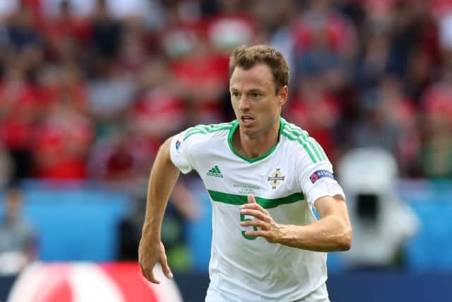 Jonny Evans is glad Michael O'Neill is still at the helm. Picture: PA