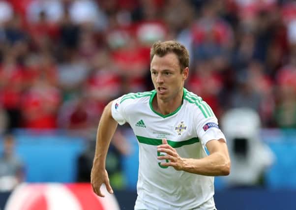 Jonny Evans is glad Michael O'Neill is still at the helm. Picture: PA