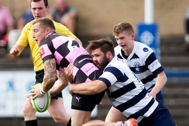 Heriots Cornell Du Preez tackles Ayrs Jamie Bova during Saturdays match at Goldenacre. Picture: SNS