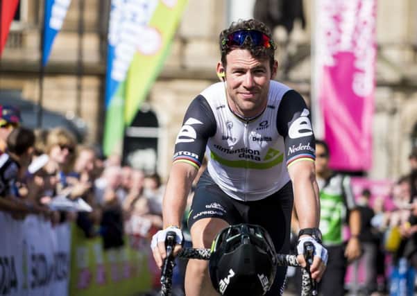 Mark Cavendish, pictured at the start, crashed late in the stage. Picture: PA