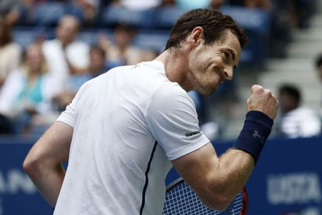 Andy Murray gestures in triumph after his victory over Paolo Lorenzi, of Italy, during the third round of the US Open. Picture: Jason DeCrow/AP