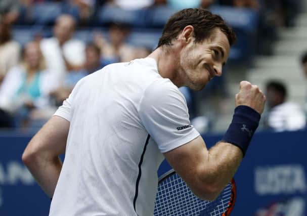 Andy Murray gestures in triumph after his victory over Paolo Lorenzi, of Italy, during the third round of the US Open. Picture: Jason DeCrow/AP