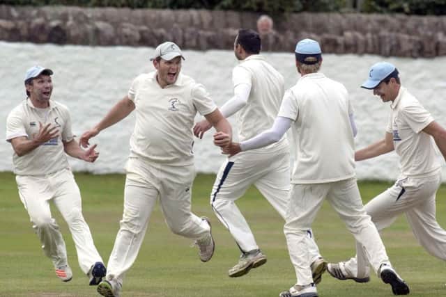 Gordon Drummond leads the celebrations after taking a second slip catch in his final match for Carlton in Saturdays Grand Final. Picture:  Donald MacLeod