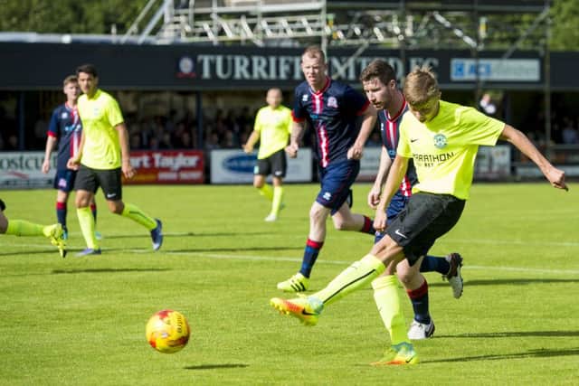 Hibernian debutant Fraser Murray scores to make it 1-0. Picture: SNS