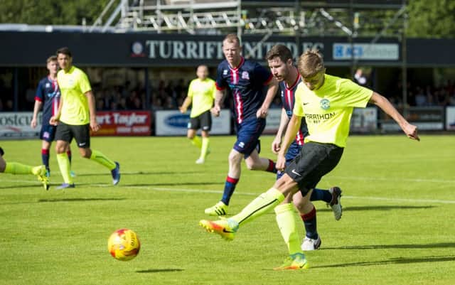 Hibernian debutant Fraser Murray scores to make it 1-0. Picture: SNS