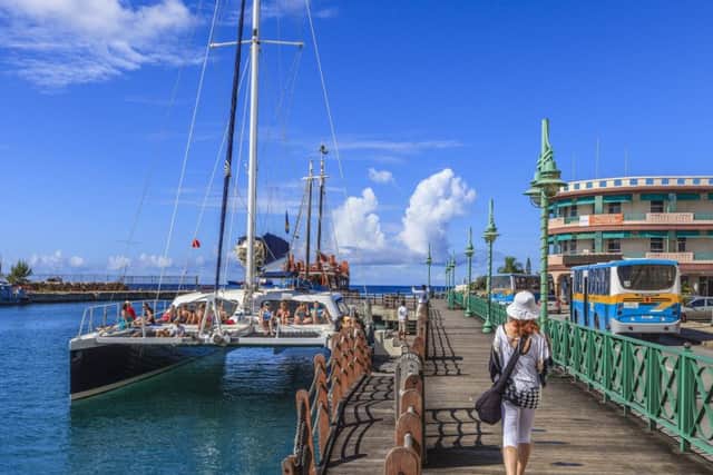 Plenty of visitors take to the Caribbean Sea on catamarans. Pic: TSPL