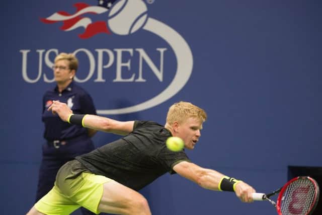 Kyle Edmund stretches for a shot during his match against Novak Djokovic. Picture: Getty.