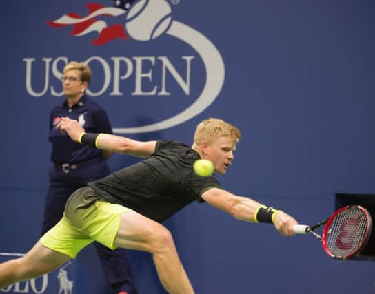 Kyle Edmund stretches for a shot during his match against Novak Djokovic. Picture: Getty.