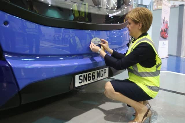First Minister Nicola Sturgeon during a visit to Alexander Dennis as more than 100 jobs are to be created. Picture: PA
