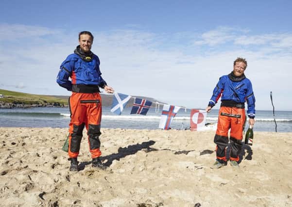 Olly Hicks, right, and George Bullard have completed a 1,200-mile kayak trip from Greenland to Scotland