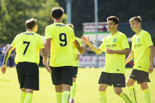Hibernian's Martin Boyle celebrates his goal with team mates during the win over Turriff United. Picture: Gary Hutchison/SNS