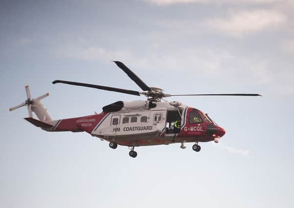 A coastguard helicopter rescued David Croft from the capsized dinghy off Orkney but he later died in hospital. Picture: John Devlin