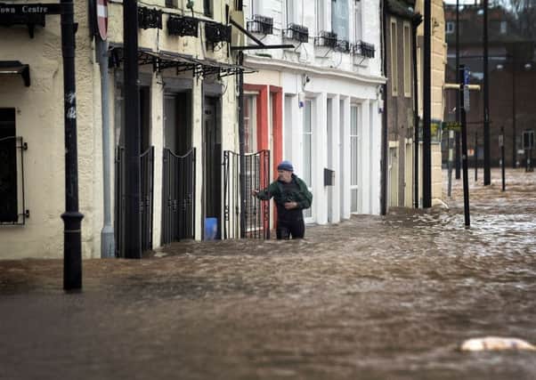 Parts of Scotland suffered from flooding last winter when Storm Frank battered the country. Picture: AFP/Getty Images