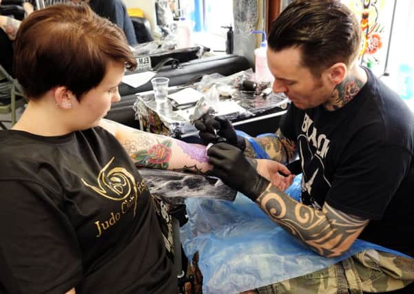 Tattoo's may now help you get a job Picture: Michael Gillen