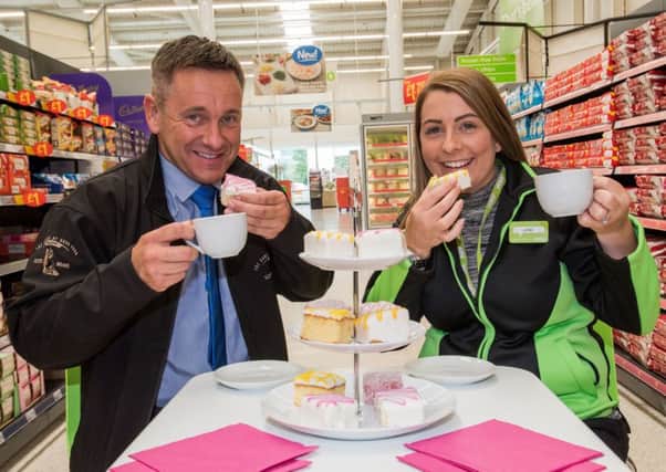Scotty Brand general manager Richard Allison with Asda buying assistant June Rose. Picture: Ian Georgeson