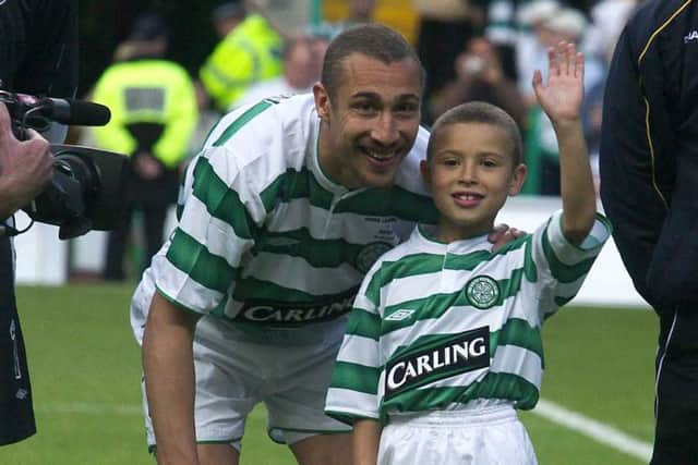 Henrik Larsson with his son Jordan before a fiendly match at Celtic Park versus Seville in 2004.