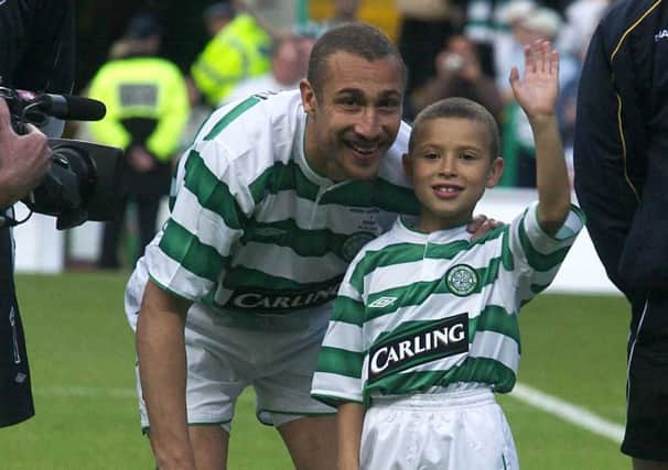 Henrik Larsson with his son Jordan before a fiendly match at Celtic Park versus Seville in 2004.