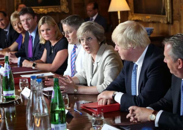 Theresa May with her new cabinet at Chequers. Picture: Mark Richards/Getty