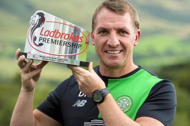 Celtic manager Brendan Rodgers with the Ladbrokes Premiership Manager of the Month award for August. Picture: Alan Harvey/SNS